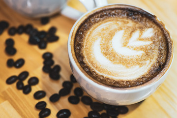 Latte hot coffee in selective focus.