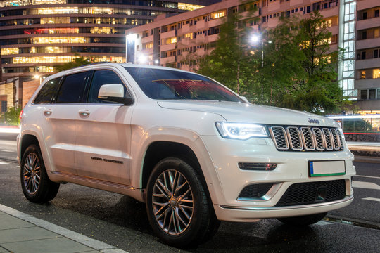 Warsaw, Poland-April 2018: New SUV Jeep Grand Cherokee model against the background of modern buildings in Warsaw