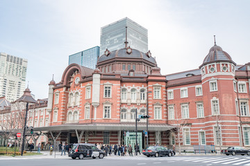 Fototapeta premium TOKYO, JAPAN - March 25 2019: Tokyo Station in Tokyo, Japan. Open in 1914, a major a railway station near the Imperial Palace grounds and Ginza commercial district