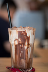 Iced chocolate in clear glass showing the texture and refreshing look of the drink