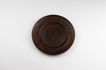 Clay plate on a white background.