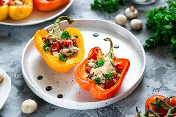 Baked pepper with chicken, mushrooms and tomatoes.