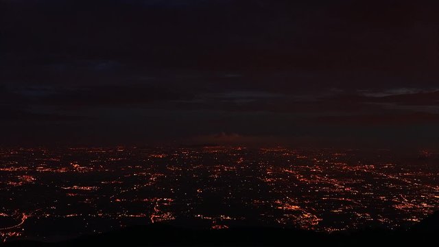 TIME LAPSE day to night of the city (bassano del grappa) shot from monte grappa ITALY