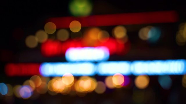 Blurry view of night market. Color Blurred background : Bokeh lighting in city night light blur bokeh , defocused background