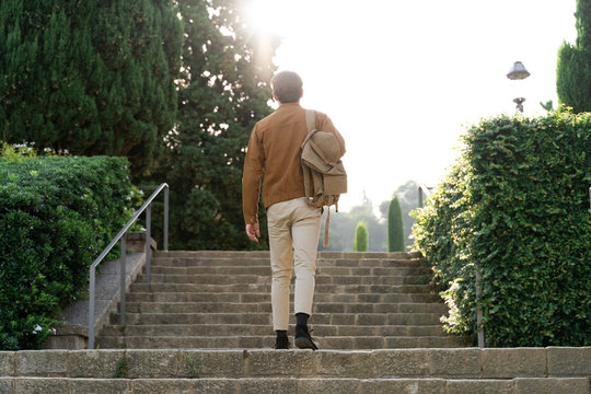 Barcelona, Spain. Business man outdoors. Casual, job, outdoor office, digital, digital nomad, millennial, young man, daytime, work, laptop, technology