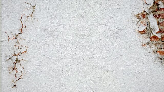 white brick wall crack collapses