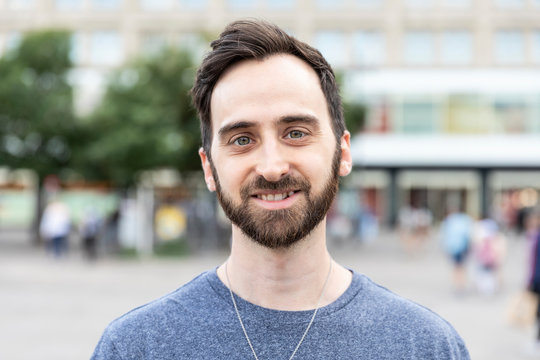 Portrait of a bearded man in the city