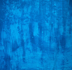 Beautiful blue painted grunge wall texture, different blue tones