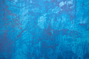 Beautiful blue painted grunge wall texture, different blue tones