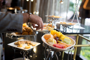people group catering buffet food indoor, with food and beverage,Eat together.