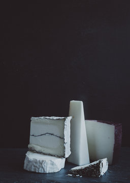 Pieces of goat and triple creme cheeses