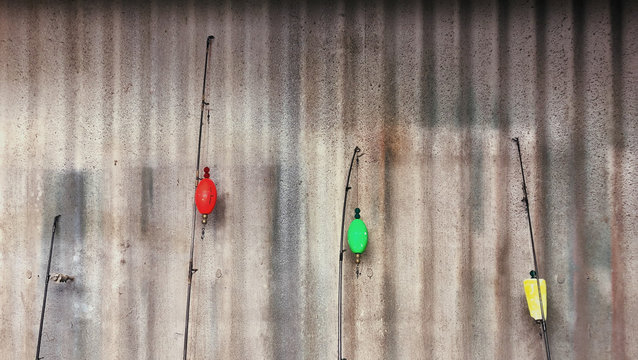 View of four colorful fishing rods