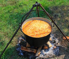 food prepared in a cauldron