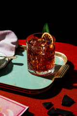 Negroni, an Iba cocktail, with 1/3 gin, 1/3 bitter, 1/3 vermut, in colorful and rich contemporary style.