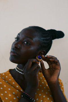 Woman wearing earring indoors