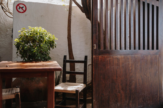 Table and chair with animal sign in background