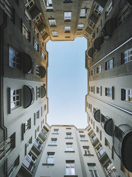 Low angle view of old and new buildings