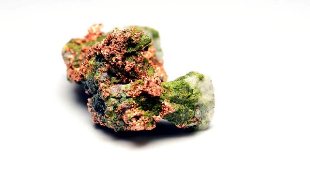 copper nugget, copper ore in a stone, closeup on a turn   table