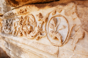 Beautiful and graceful ornament, an element of buildings. Parts of the ruins and ruins of ancient antiquity.