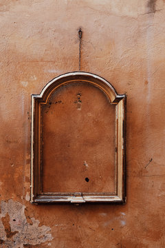 Empty picture frame on wall