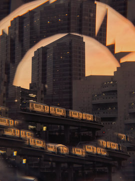 View of train and skyscrapers through prism filter