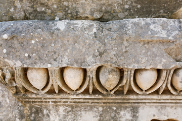 Beautiful and graceful ornament, an element of buildings. Parts of the ruins and ruins of ancient antiquity.