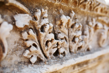 Beautiful and graceful ornament, an element of buildings. Parts of the ruins and ruins of ancient antiquity.