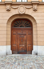 Old wooden door with carved ornaments.