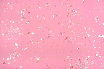 Foto op Aluminium Pearl confetti on pink background. © Anna