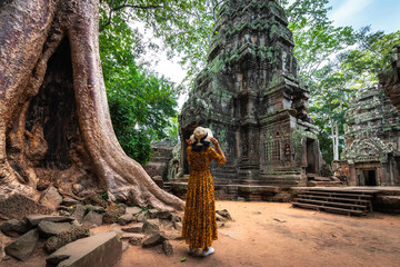 Ta Prohm temple in Angkor Wat is a public place in Siem Reap, Cambodia. It is a beautiful ancient architecture. - obrazy, fototapety, plakaty