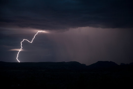 Evening landscape with lightning and rain - Powered by Adobe