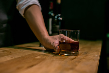 glass of wine in hand