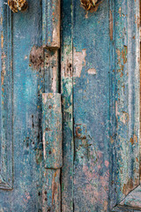 Fragment of an old blue door
