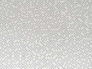 Gray and white ceramic wall tiles abstract background.Mosaic texture for decoration of bathroom.Wallpaper tiles background.Background of squares in different shades.