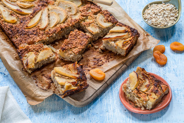 Pear, apricot, almond and oats breakfast squares - high angle view