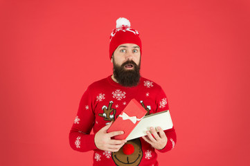 What a great surprise. happy new 2020 year. surprised bearded man open box. man hipster feel surprise. winter holidays. what is inside. oh my god. merry christmas. got xmas gift. present from santa