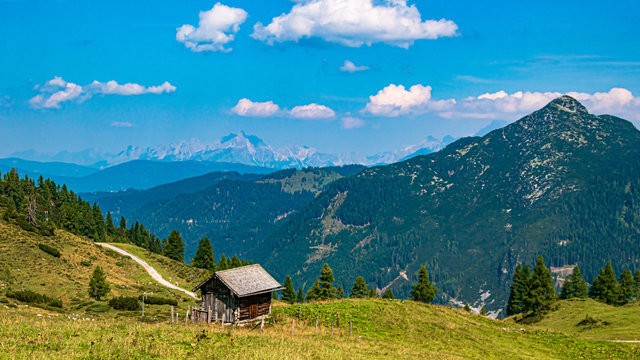 Beautiful alpine view with a wooden hut at Zauchensee, Salzburg, Austria