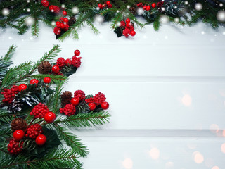 Naklejka na ściany i meble christmas decoration on fir branches background