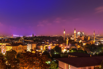 Hagia Sophia and the bridge over the night Bosphorus. Istanbul, Turkey