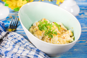 Scrambled eggs with onion.