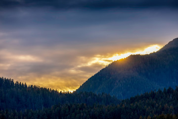 Sun Peaking through Clouds, Mountains, 