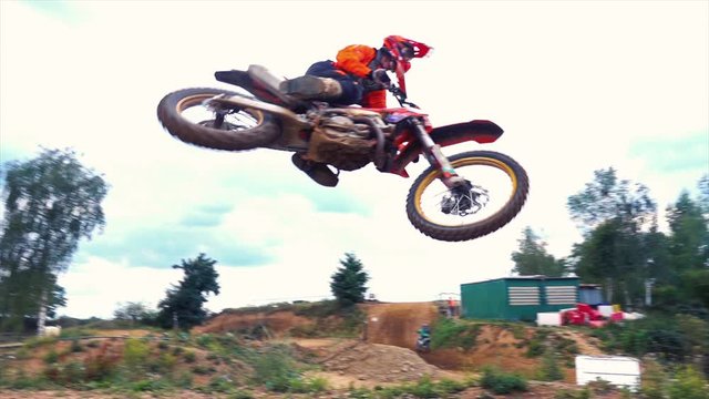 Extreme Motocross MX Rider riding on dirt track