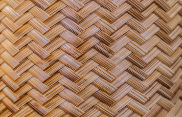Close-up of the pattern of Kratib sticky rice Thai handicrafts in the northeastern and northern regions, wicker containers made from natural materials such as bamboo, palm leaves