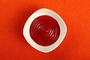 Ketchup in bowl. Directly Above.