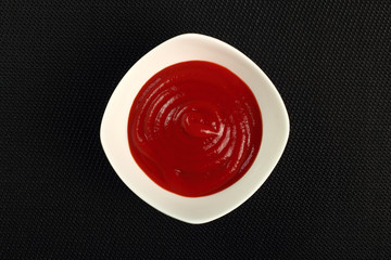 Ketchup in bowl. Directly Above.