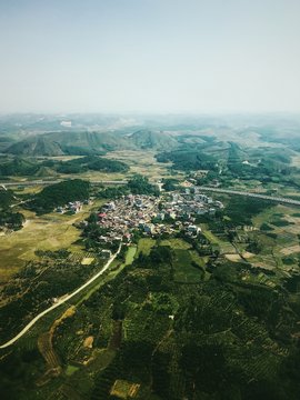 Scenic view of town against clear sky
