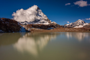 Reflection of the Matterhorn in Theodulgletschersee lake