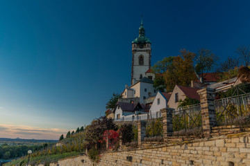 Fototapeta premium Church castle and old houses in old town Melnik in central Bohemia