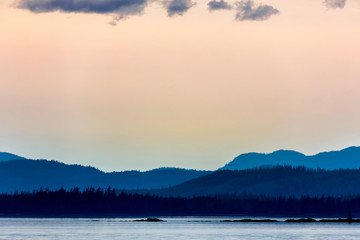 Fototapeta na wymiar Pink Sunset over archipelago and Mountains