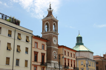 Fototapeta na wymiar clock tower Piazza Tre Martiri square in Rimini Italy